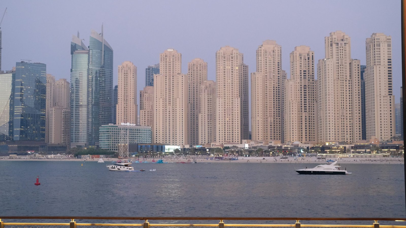 a large body of water next to a large city